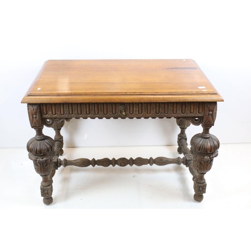 706 - Jacobean Revival Oak Dining Table  with carved frieze and heavily carved cup and cover supports, 79c... 