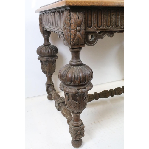 706 - Jacobean Revival Oak Dining Table  with carved frieze and heavily carved cup and cover supports, 79c... 