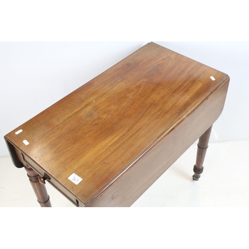 707 - 19th century Mahogany Pembroke Table with drawer to end and raised on turned legs terminating in cas... 