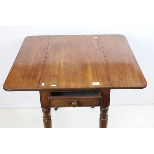 707 - 19th century Mahogany Pembroke Table with drawer to end and raised on turned legs terminating in cas... 