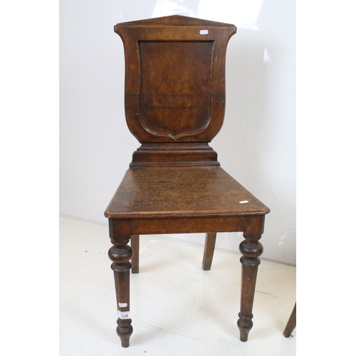 708 - 19th century Mahogany Hall Chair with shield shape back, 95cm high x 48cm wide together with a Carve... 