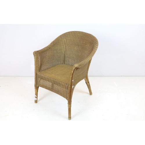 709 - Lloyd Loom Tub Chair with gold finish and label to base, 68cm high x 53cm wide