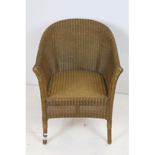 709 - Lloyd Loom Tub Chair with gold finish and label to base, 68cm high x 53cm wide