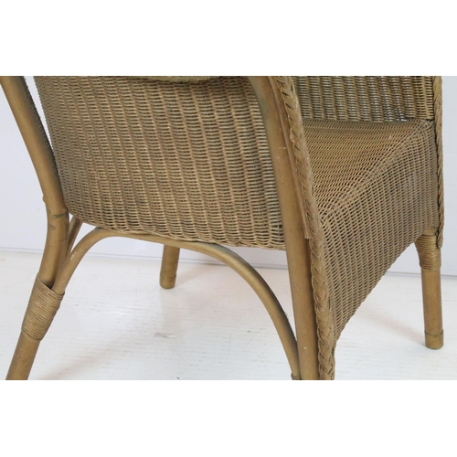 709 - Lloyd Loom Tub Chair with gold finish and label to base, 68cm high x 53cm wide