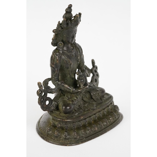 218 - Buddhist bronze figure of Guan Yin in a seated pose