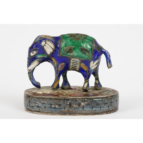 221 - A sterling silver miniature horse and elephant figures with enamel decoration.