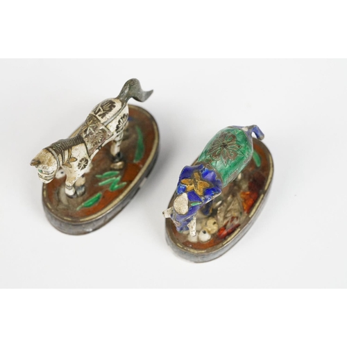 221 - A sterling silver miniature horse and elephant figures with enamel decoration.