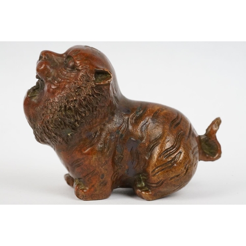 224 - An ornamental Chinese bronze tiger, stands approx 4cm in height.