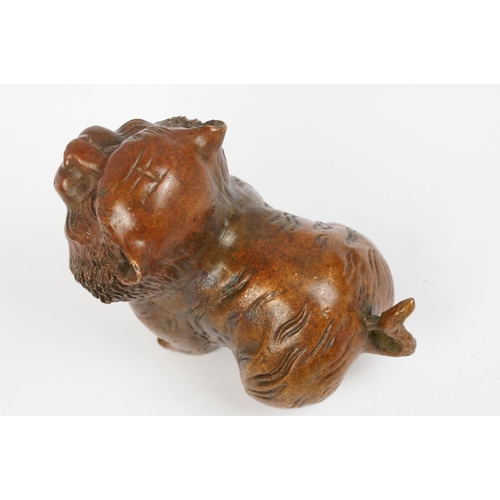 224 - An ornamental Chinese bronze tiger, stands approx 4cm in height.