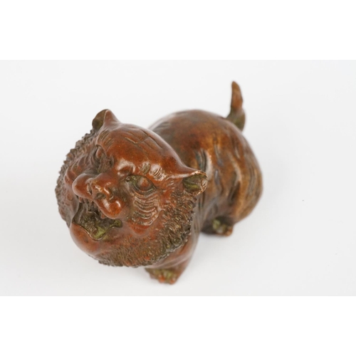 224 - An ornamental Chinese bronze tiger, stands approx 4cm in height.