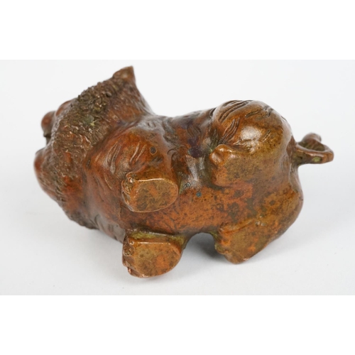 224 - An ornamental Chinese bronze tiger, stands approx 4cm in height.