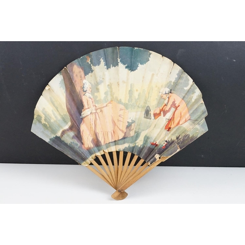 225 - An antique French paper fan with figural decoration on wooden frame, marked the Ritz Restaurant to v... 