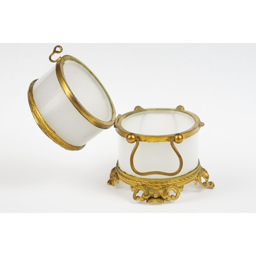 229 - An antique opaque glass and gilt metal with central panel jewellery / trinket box / casket.