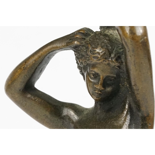 230 - A bronze figure of a nude lady, stands approx 16cm in height.