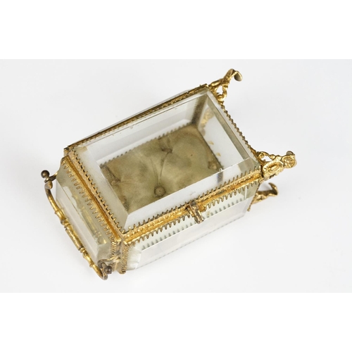 234 - An antique 19th century glass paneled jewellery casket.