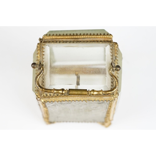 234 - An antique 19th century glass paneled jewellery casket.