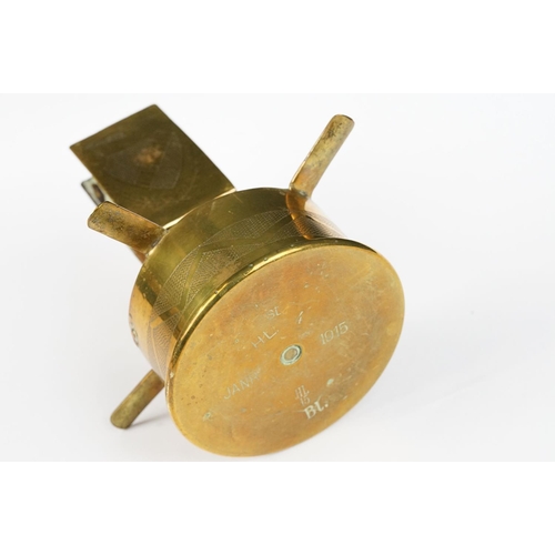 289 - A trench art ashtray matchbox holder combination made from a brass artillery round together with an ... 