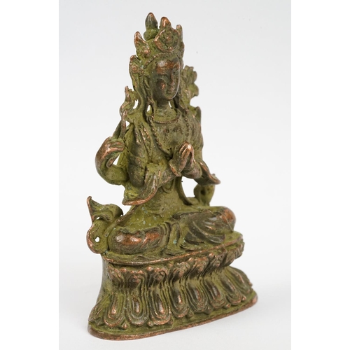 290 - An oriental bronze figure of Guanyin, stands approx 10cm in height.