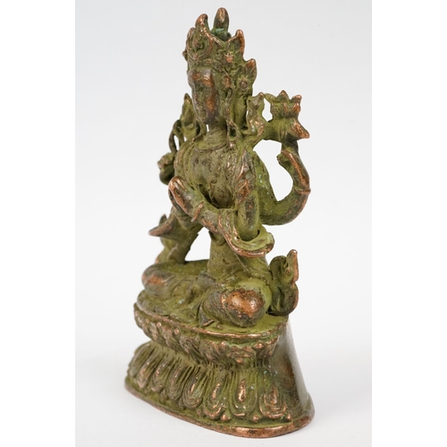 290 - An oriental bronze figure of Guanyin, stands approx 10cm in height.