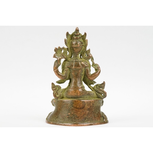 290 - An oriental bronze figure of Guanyin, stands approx 10cm in height.