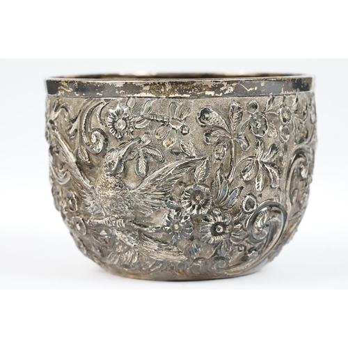 298 - A fully hallmarked sterling silver bowl with floral and bird repouse design.