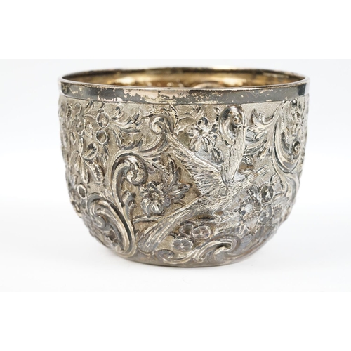 298 - A fully hallmarked sterling silver bowl with floral and bird repouse design.