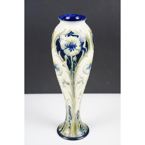 6 - William Moorcroft for Macintyre Florian ware inverted baluster vase, with tubelined blue, green & ye... 