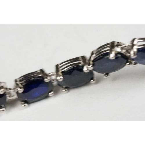 261 - Silver and Sapphire Line Bracelet with CZ Snake Head Clasp