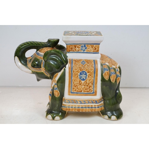 101 - Two ceramic elephant stools / lamp tables featuring a polychrome glazed example and grey example. Ta... 