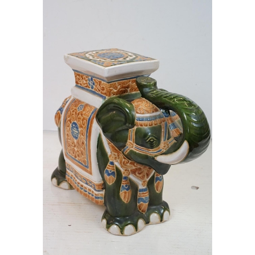 101 - Two ceramic elephant stools / lamp tables featuring a polychrome glazed example and grey example. Ta... 