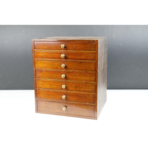 132 - 19th century Mahogany Table Top Collector's Cabinet of Seven Drawers, 24cm wide x 28cm high