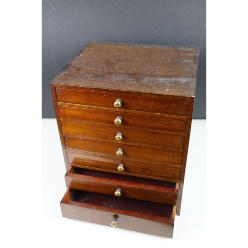 132 - 19th century Mahogany Table Top Collector's Cabinet of Seven Drawers, 24cm wide x 28cm high