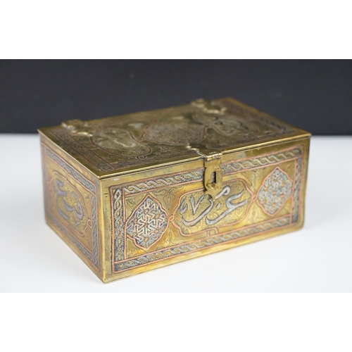 135 - Late 19th / early 20th century Middle Eastern brass cigarette box with engraved decoration, silverin... 