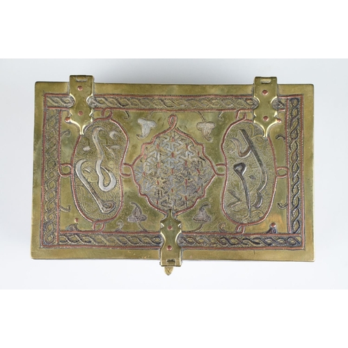 135 - Late 19th / early 20th century Middle Eastern brass cigarette box with engraved decoration, silverin... 