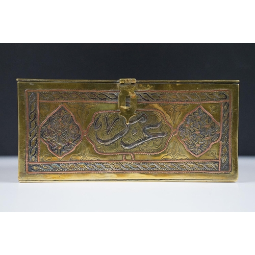 135 - Late 19th / early 20th century Middle Eastern brass cigarette box with engraved decoration, silverin... 