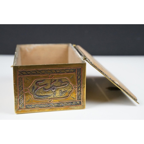 135 - Late 19th / early 20th century Middle Eastern brass cigarette box with engraved decoration, silverin... 