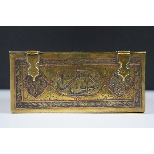 135 - Late 19th / early 20th century Middle Eastern brass cigarette box with engraved decoration, silverin... 