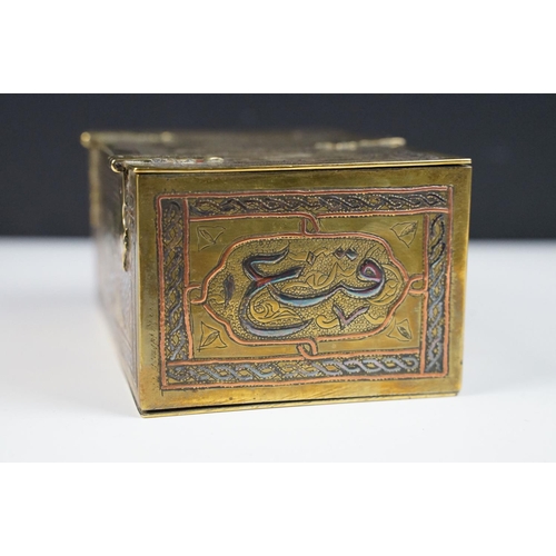 135 - Late 19th / early 20th century Middle Eastern brass cigarette box with engraved decoration, silverin... 