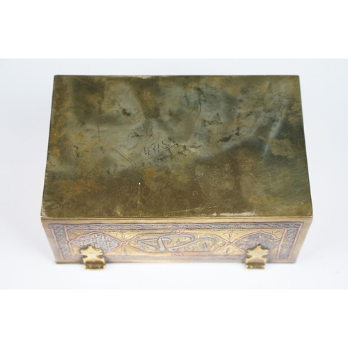 135 - Late 19th / early 20th century Middle Eastern brass cigarette box with engraved decoration, silverin... 