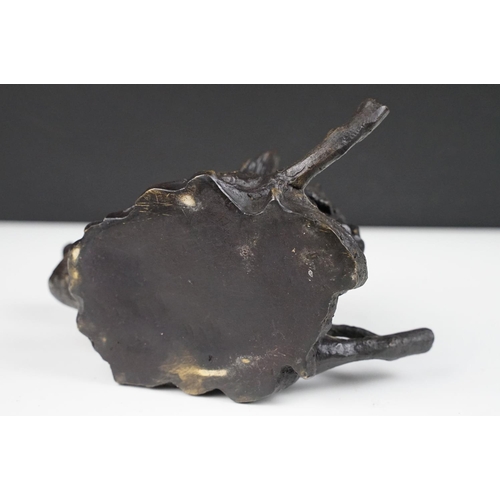 137 - Patinated metal novelty desk inkwell in the form of a boar (with liner), plus a cast metal dish of l... 