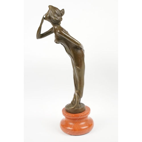 140 - Bronze Figure of an Art Deco style Lady on a stepped base, approx 21.5cm tall