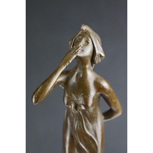 140 - Bronze Figure of an Art Deco style Lady on a stepped base, approx 21.5cm tall