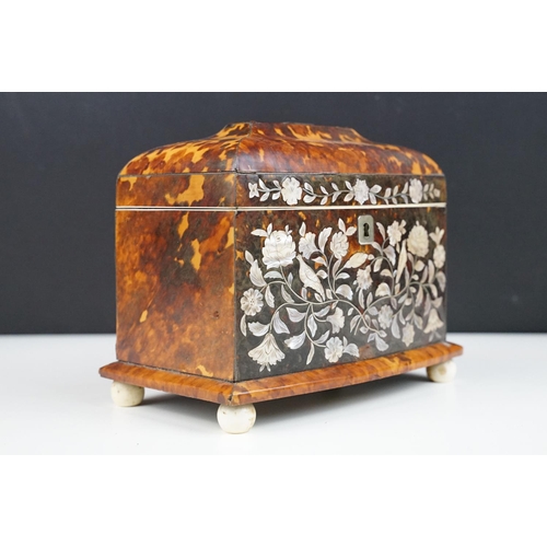 141 - 19th Century tortoiseshell twin compartment tea caddy, of sarcophagus form, with detailed mother of ... 