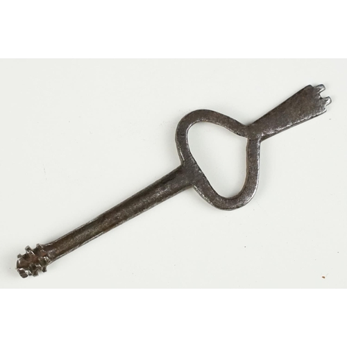 144 - Pair of 19th century steel handcuffs, approx 13cm wide, with key