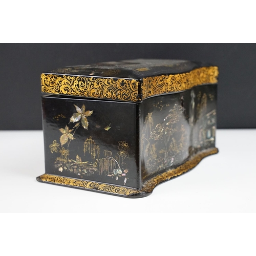 147 - Victorian black lacquered twin compartment tea caddy with shaped front, the lid inlaid abalone shell... 