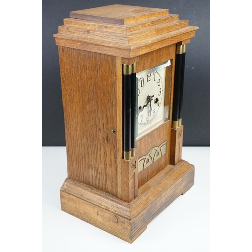 149 - Early-to-mid 20th century German H. A. C oak 14 day strike mantel clock, no. 3270, the case of stepp... 