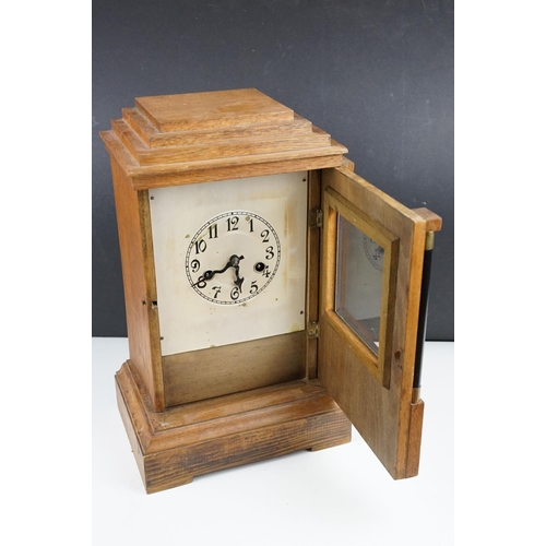 149 - Early-to-mid 20th century German H. A. C oak 14 day strike mantel clock, no. 3270, the case of stepp... 