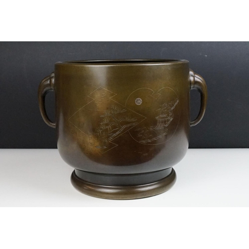 158 - Large Chinese Bronze Twin Handled Censer engraved with landscape scenes and silver inlay, 24cm high