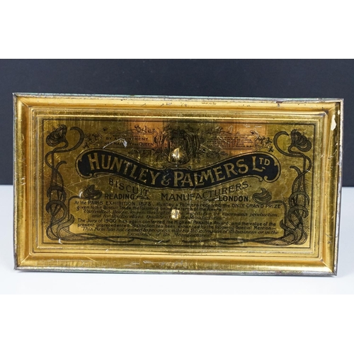 188 - Early 20th Century Huntley & Palmers biscuit tin have a double lidded compartment featuring embossed... 