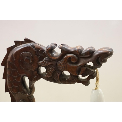 195 - Art Deco era Chinese carved hard wood table lamp carved into the form of a Chinese dragon with pierc... 